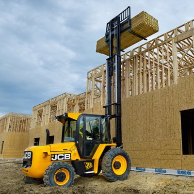Forklift unloading machinery and industrial equipment in Barking